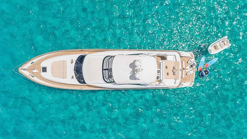 a small metal object on a green surface aboard LEX Yacht for Sale