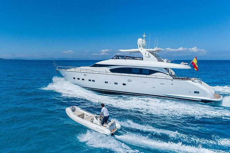 a man on a boat in the water aboard LEX Yacht for Sale