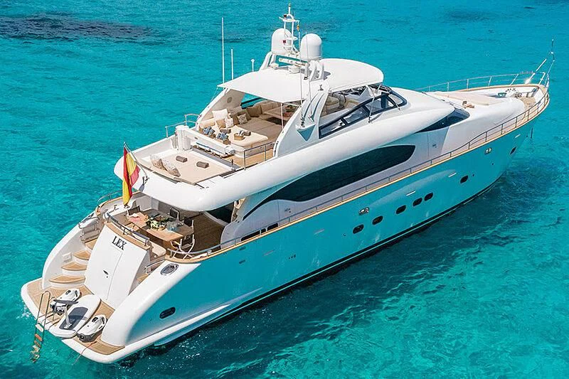 a white yacht on the water aboard LEX Yacht for Sale