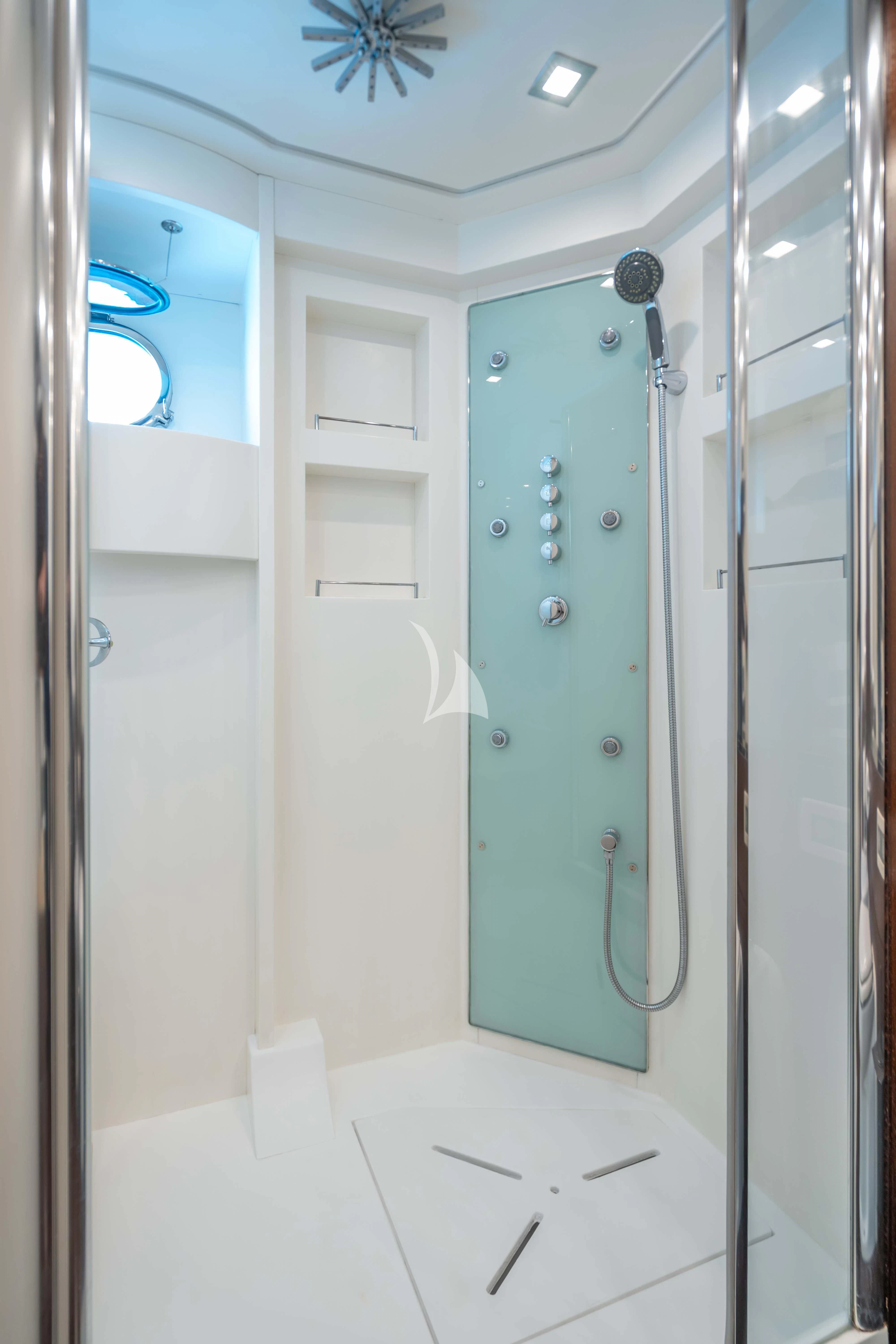 a shower unit with a shower head aboard LEX Yacht for Sale