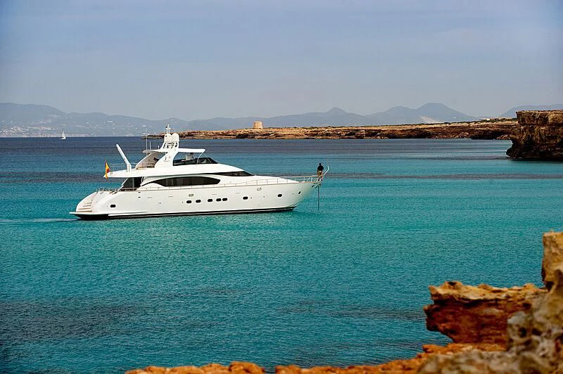 a white boat in the water aboard LEX Yacht for Sale