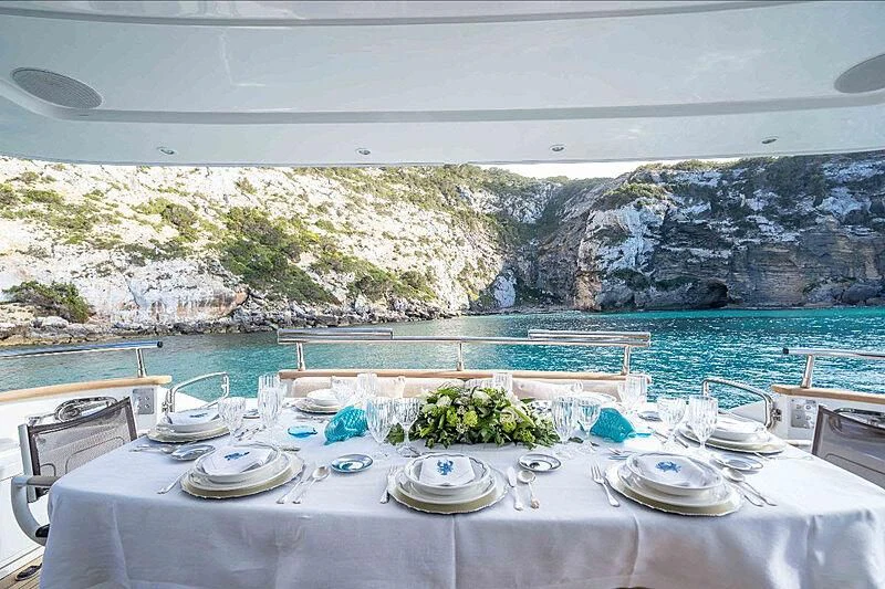 a table set for a meal aboard LEX Yacht for Sale