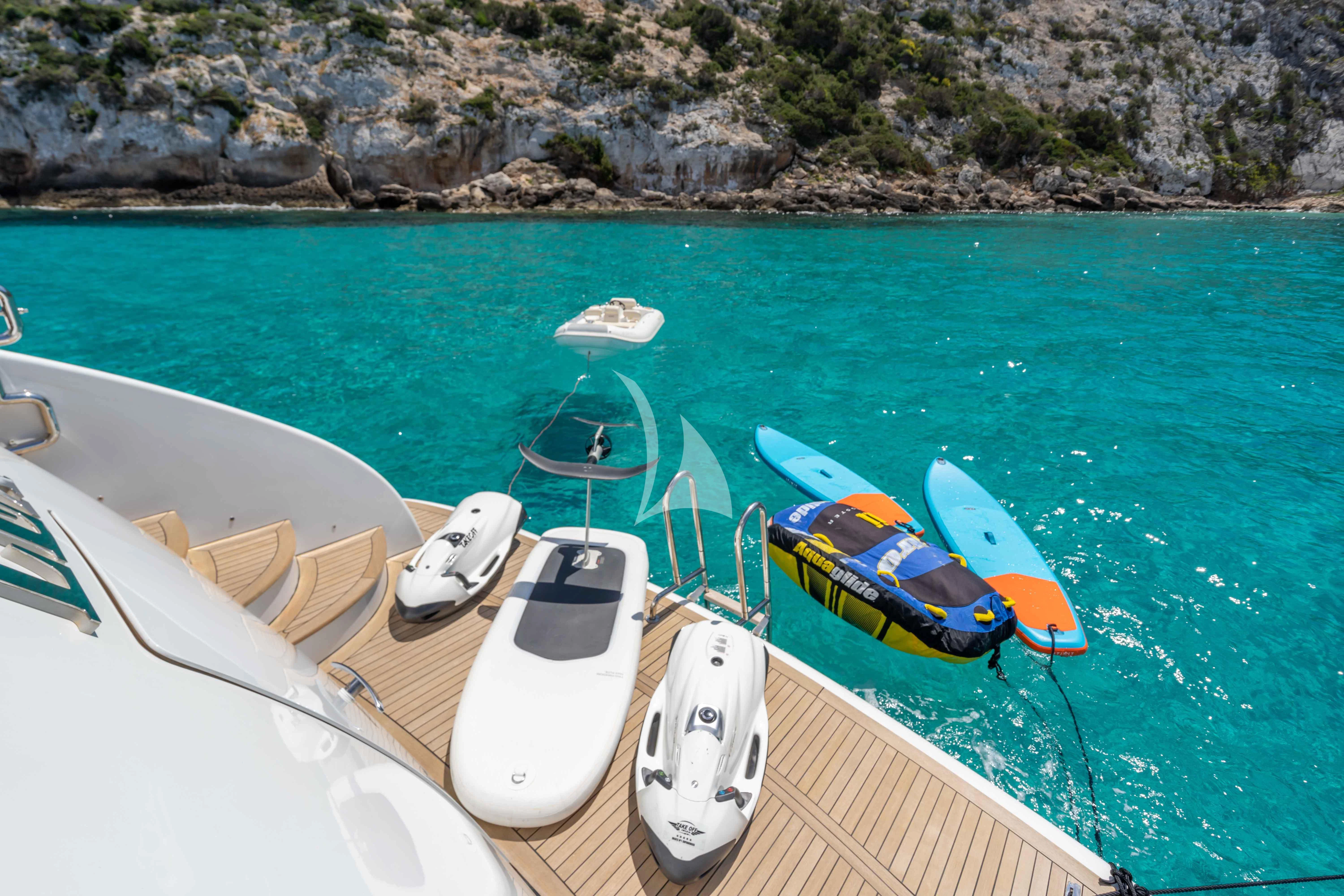 boats on a beach aboard LEX Yacht for Sale
