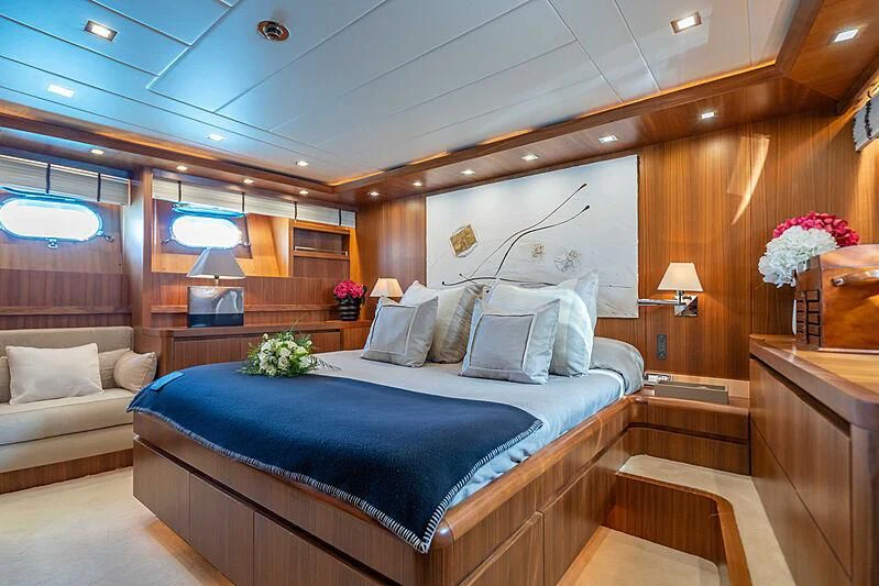a bed in a room aboard LEX Yacht for Sale