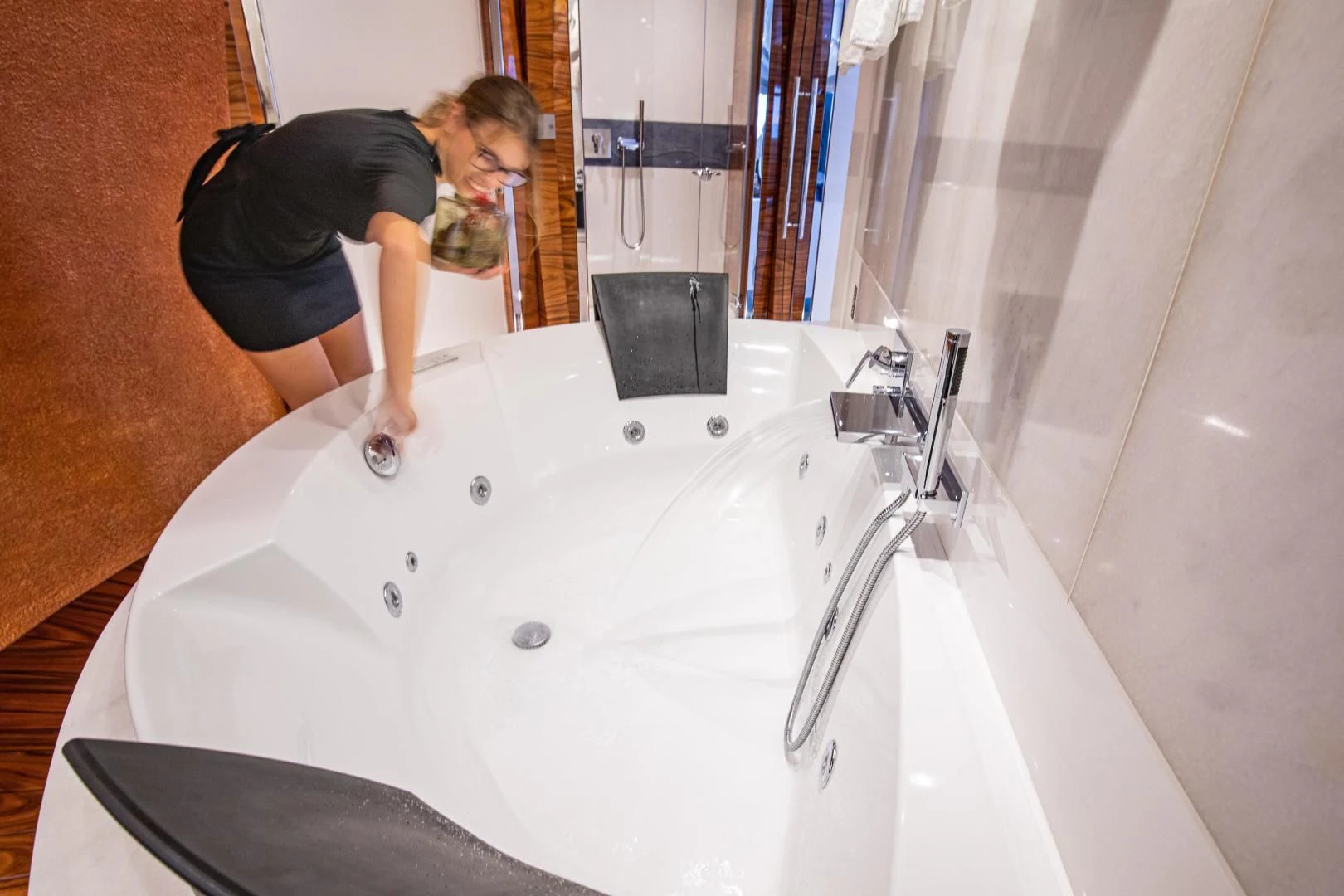 a person standing on a bathtub aboard HATT MILL Yacht for Sale
