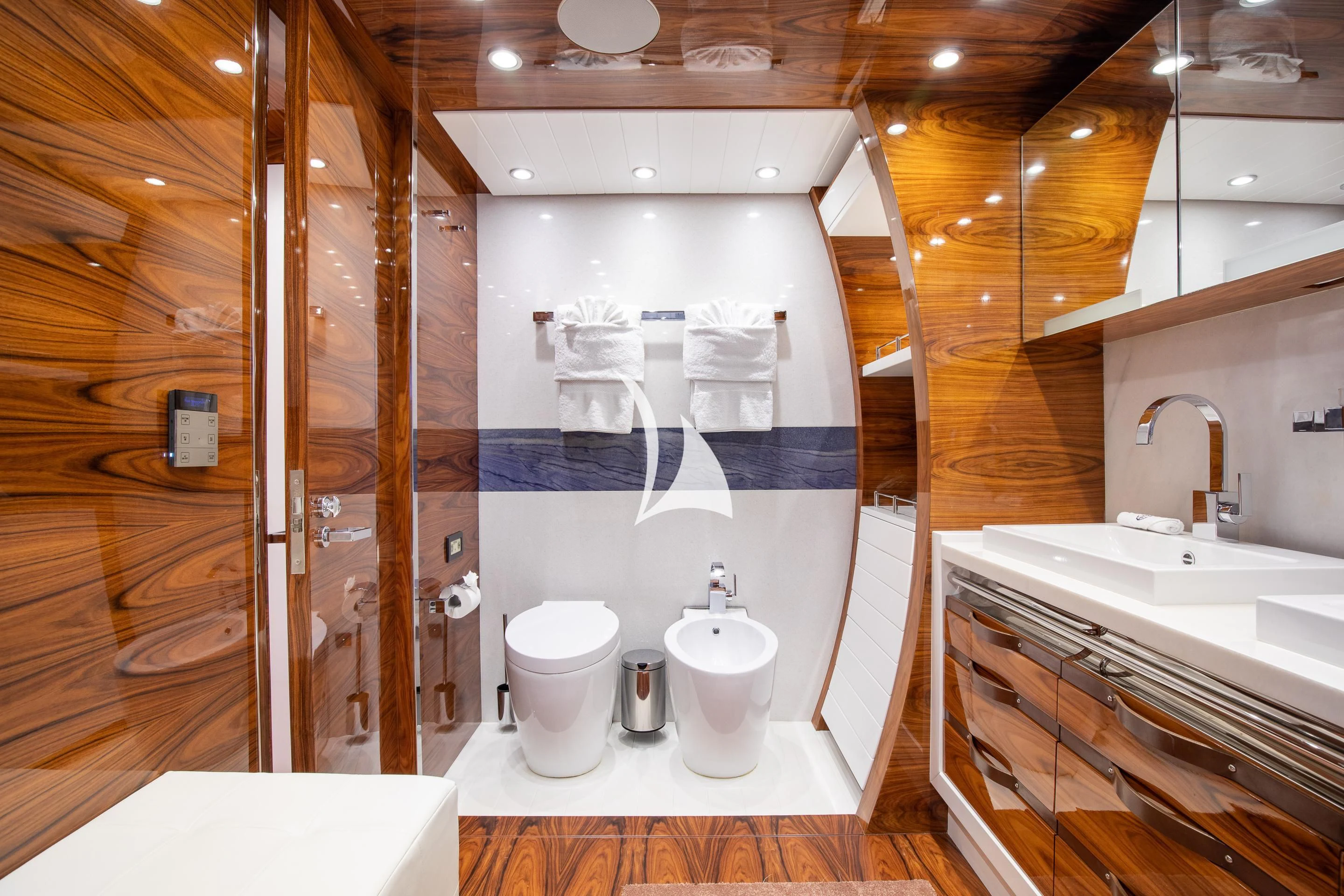 a bathroom with a glass shower aboard HATT MILL Yacht for Sale
