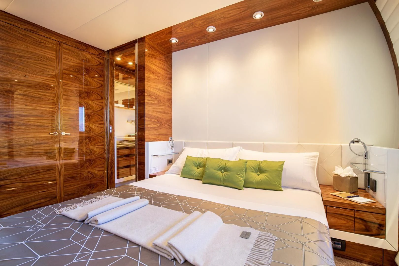 a bed with a white sheet aboard HATT MILL Yacht for Sale