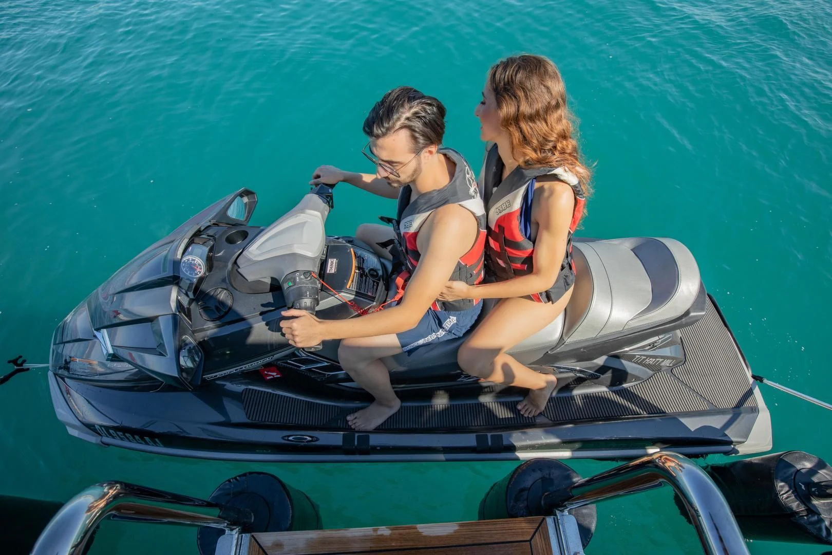 a couple of kids in a go kart aboard HATT MILL Yacht for Sale