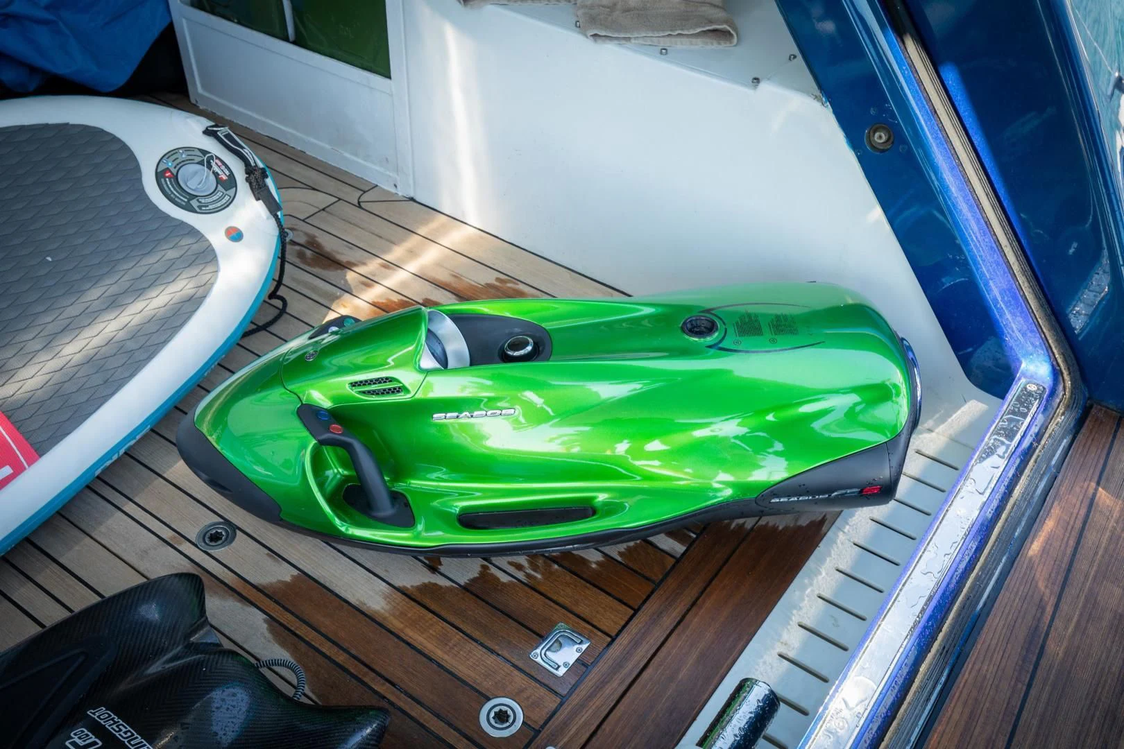 a green and black object on a wooden surface aboard HATT MILL Yacht for Sale