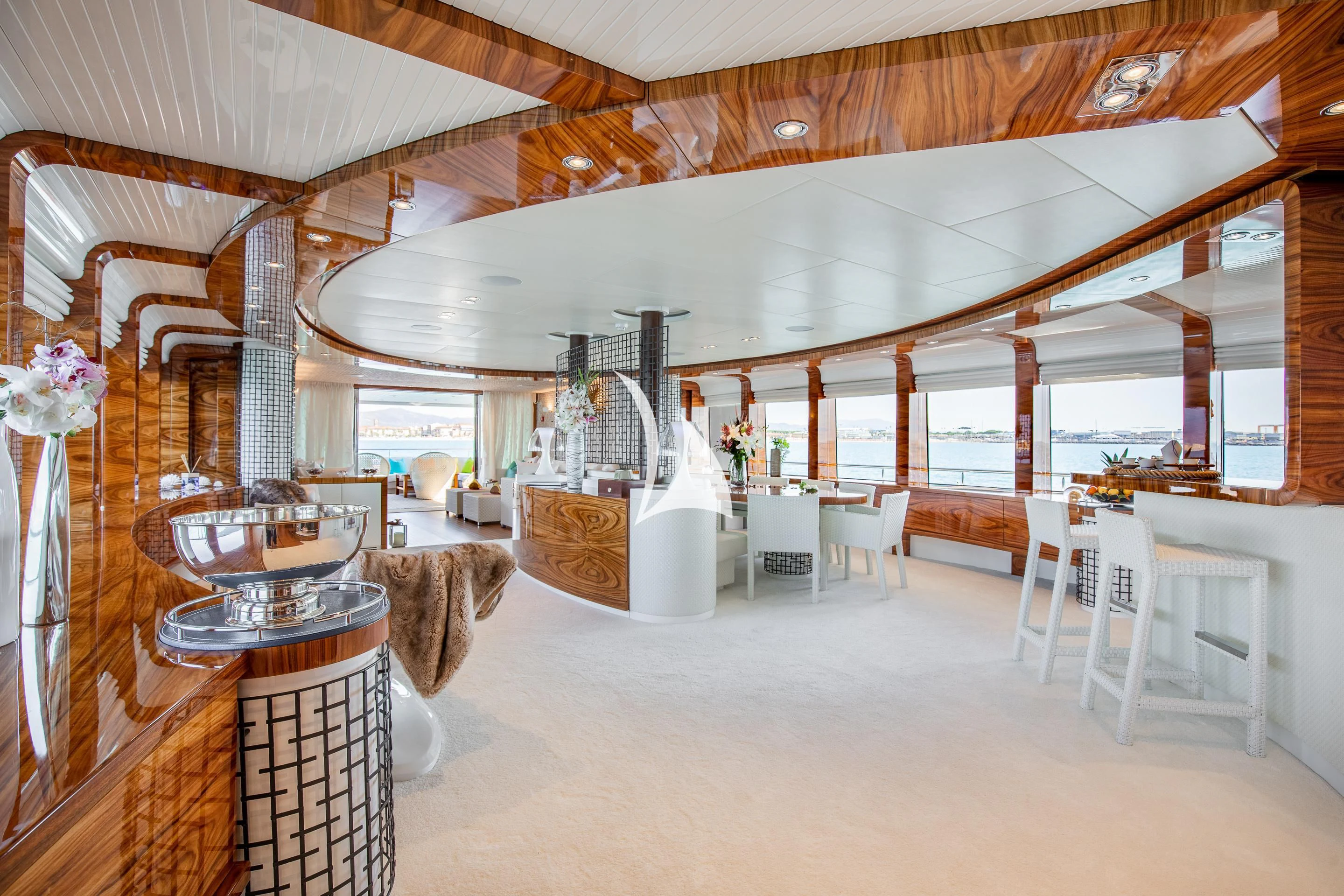 a large room with tables and chairs aboard HATT MILL Yacht for Sale