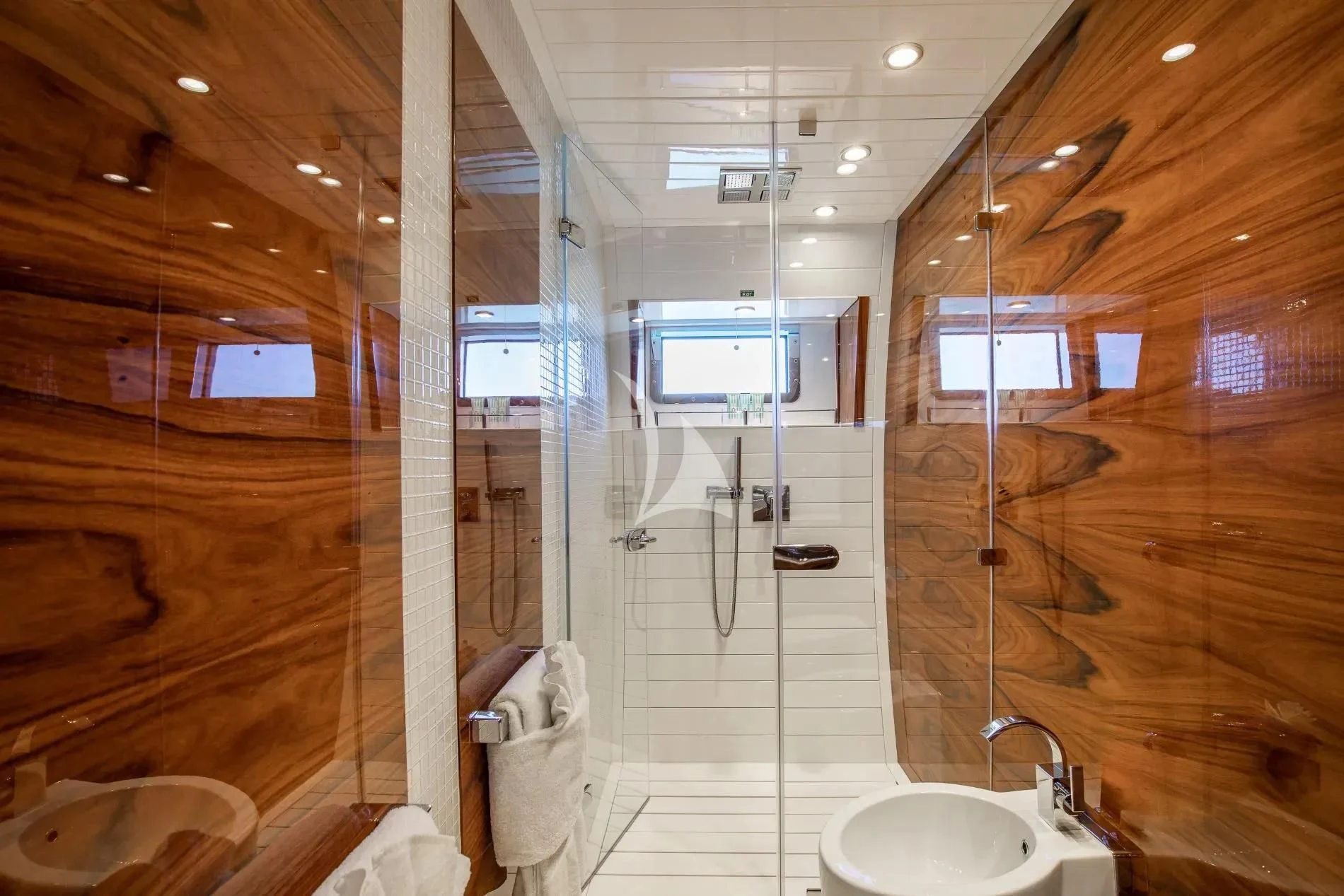 a bathroom with a glass shower aboard HATT MILL Yacht for Sale