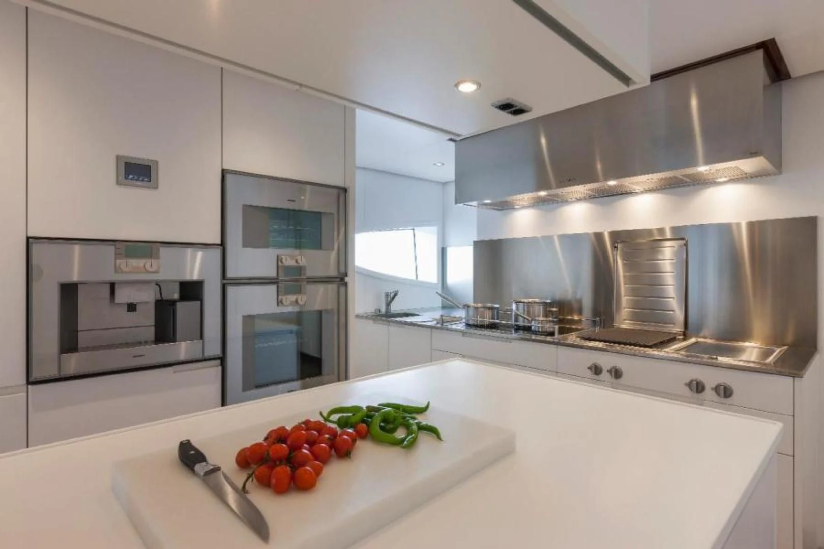a kitchen with a stainless steel sink aboard HATT MILL Yacht for Sale