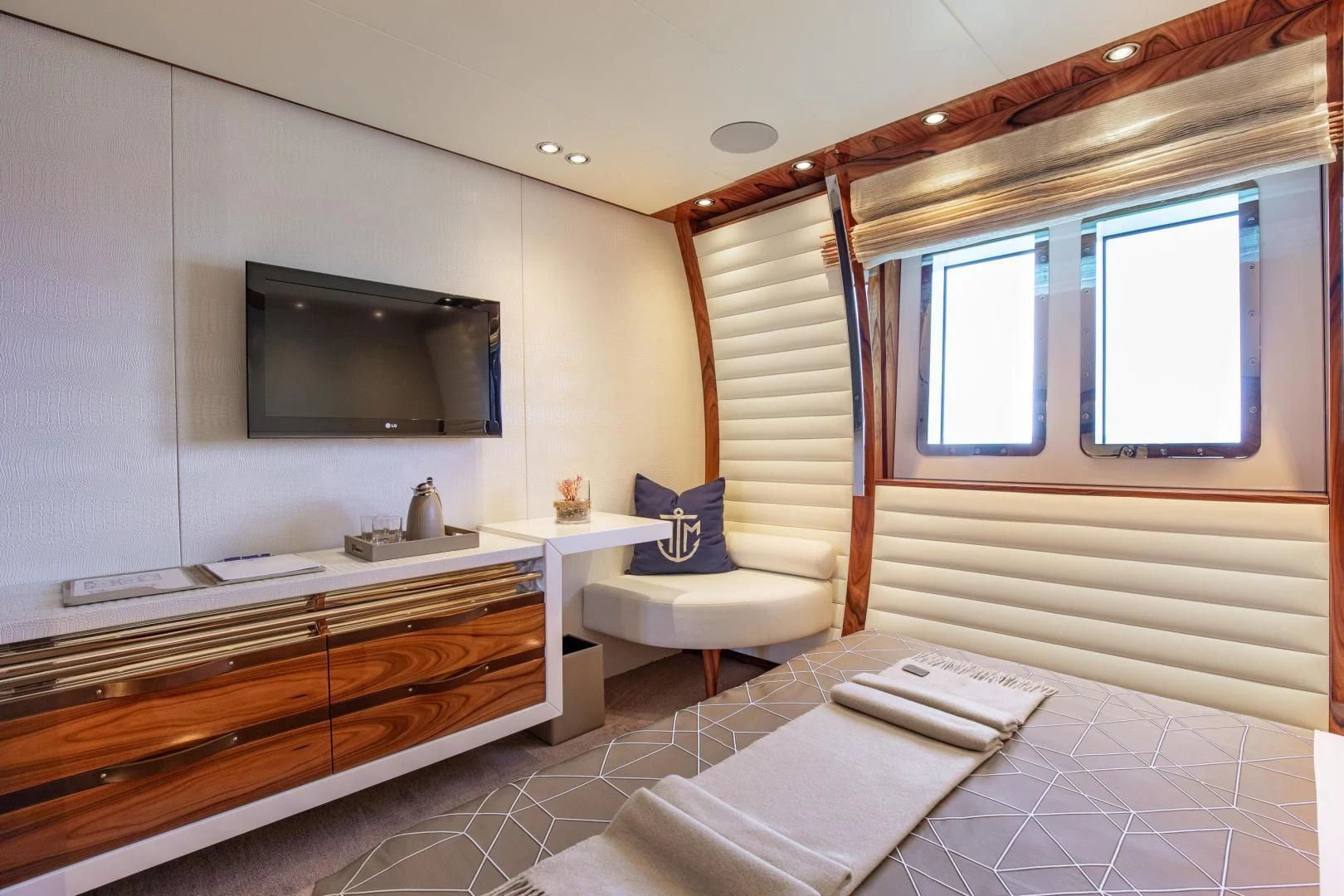 a room with a tv and a couch aboard HATT MILL Yacht for Sale