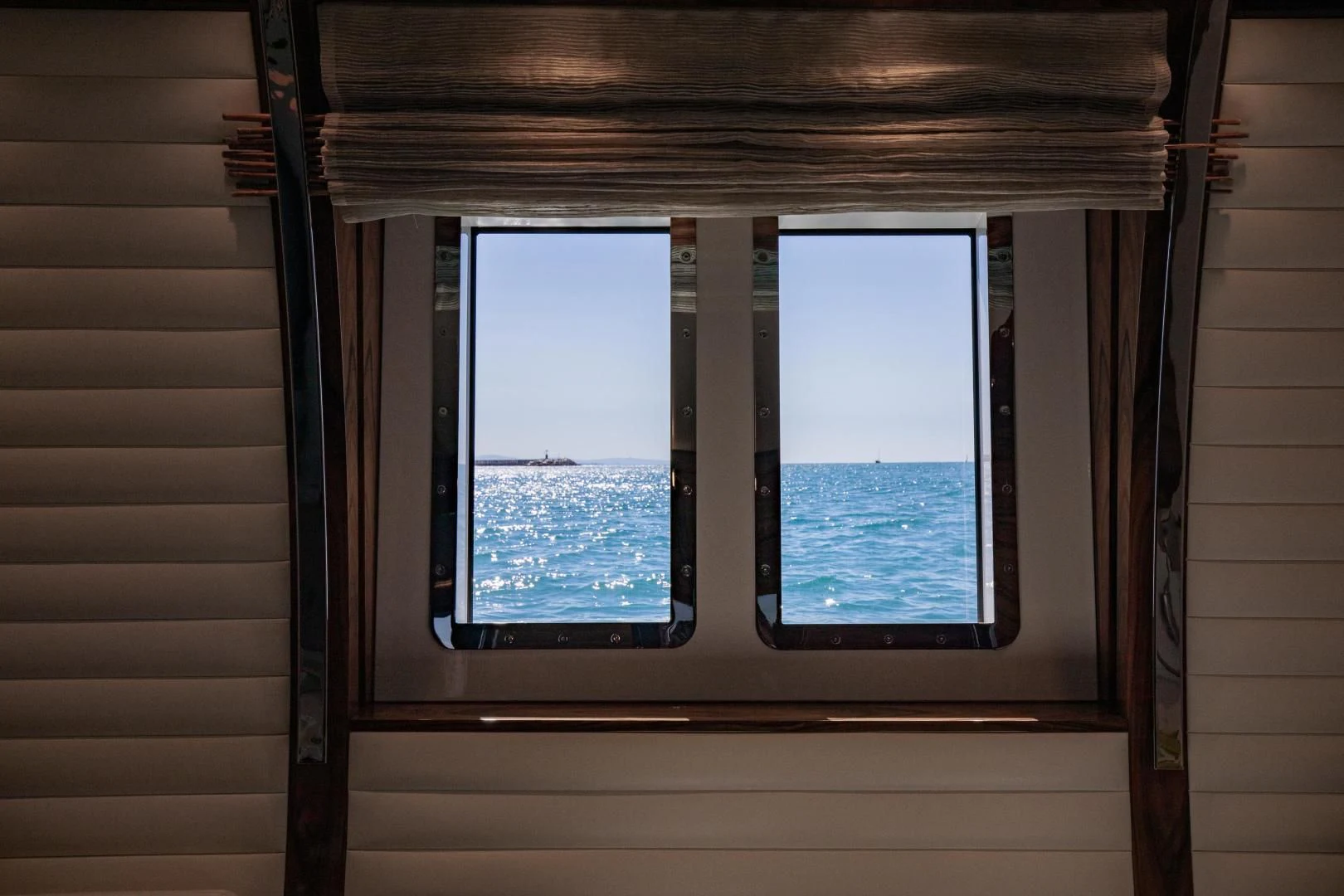 a window with a view of the ocean aboard HATT MILL Yacht for Sale
