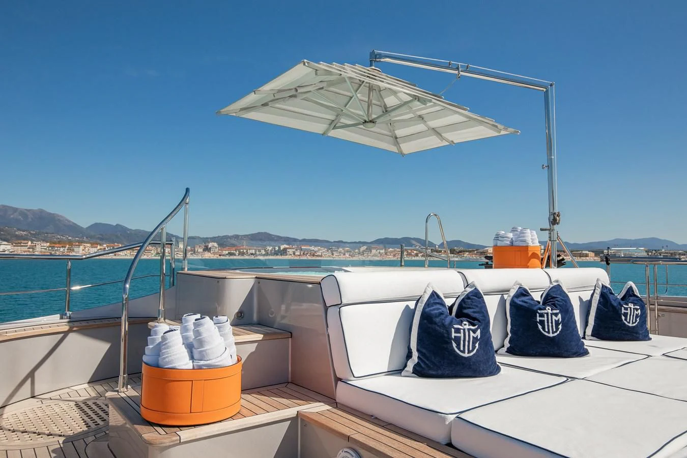 a boat with a umbrella on it aboard HATT MILL Yacht for Sale
