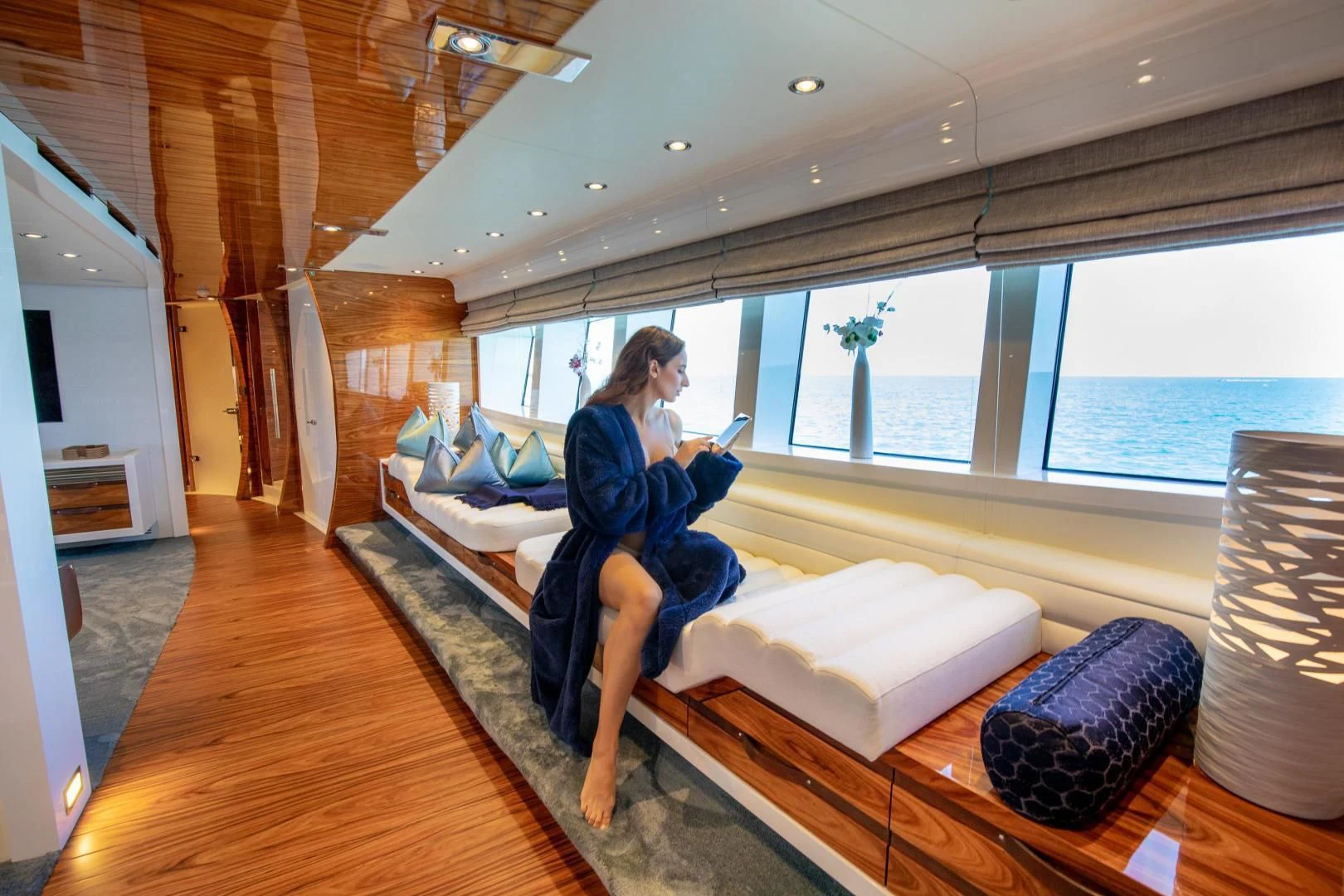 a person sitting on a couch aboard HATT MILL Yacht for Sale