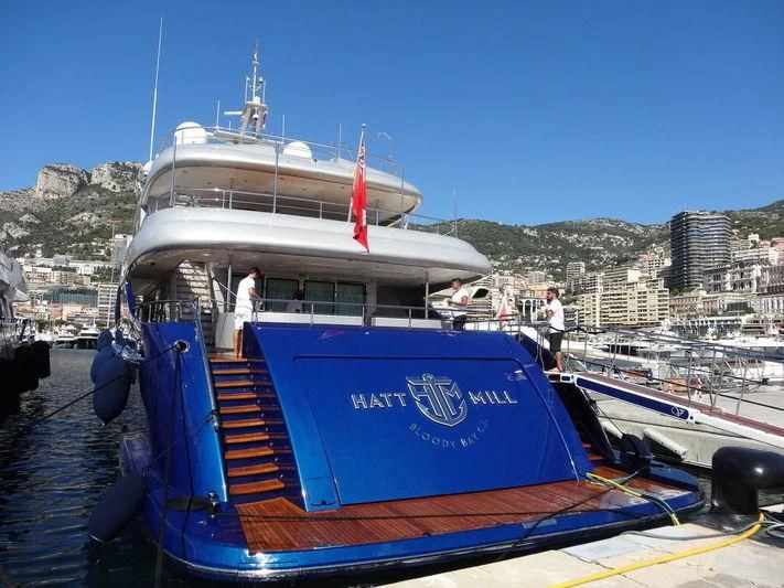 a boat docked at a pier aboard HATT MILL Yacht for Sale