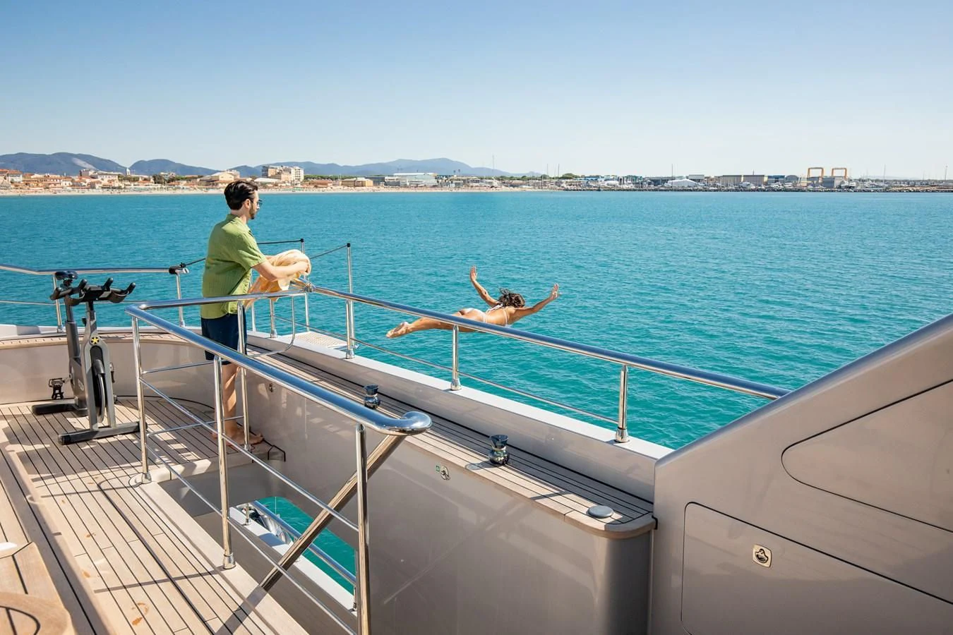 a man and a woman on a boat with a dog aboard HATT MILL Yacht for Sale