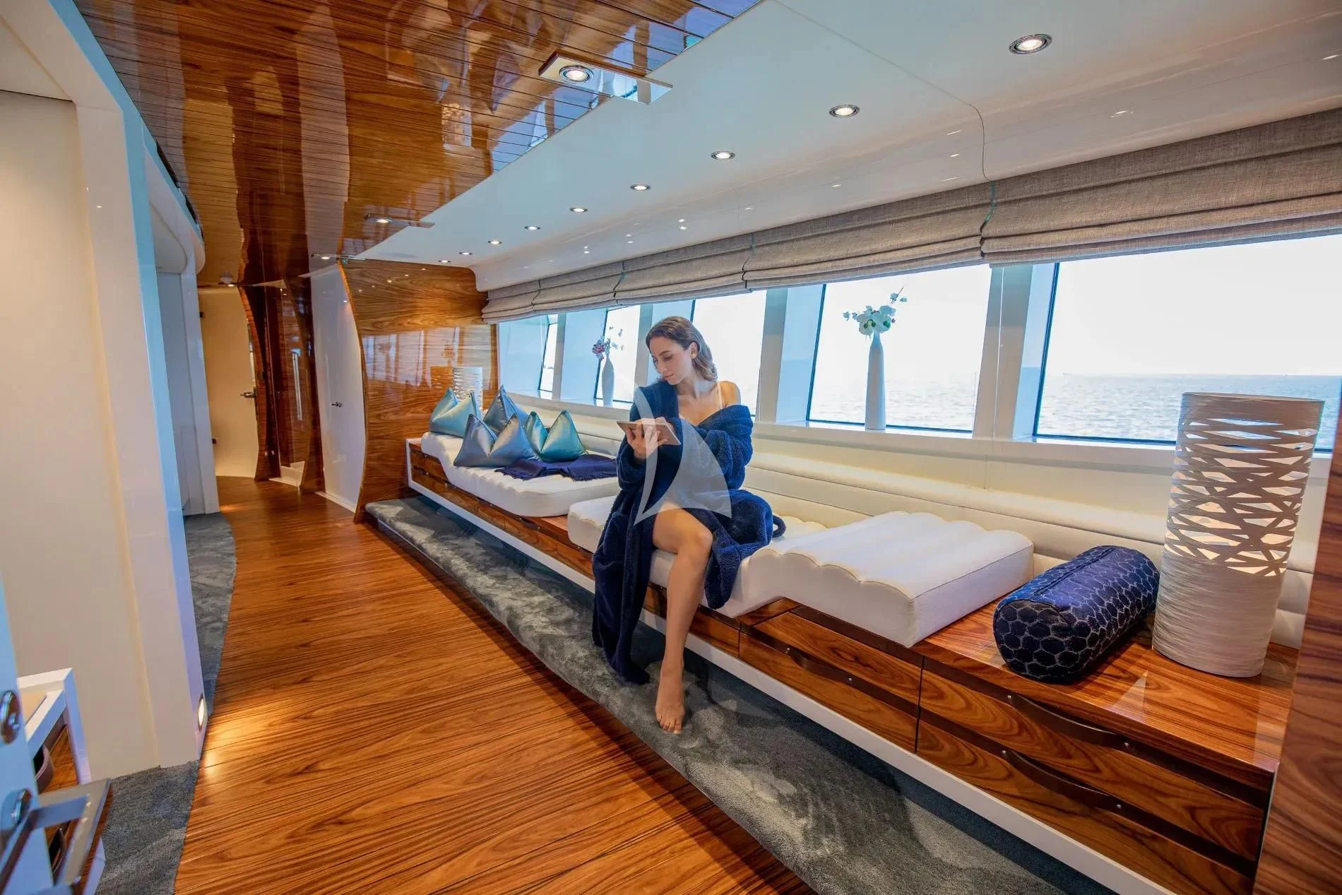 a person sitting on a couch aboard HATT MILL Yacht for Sale