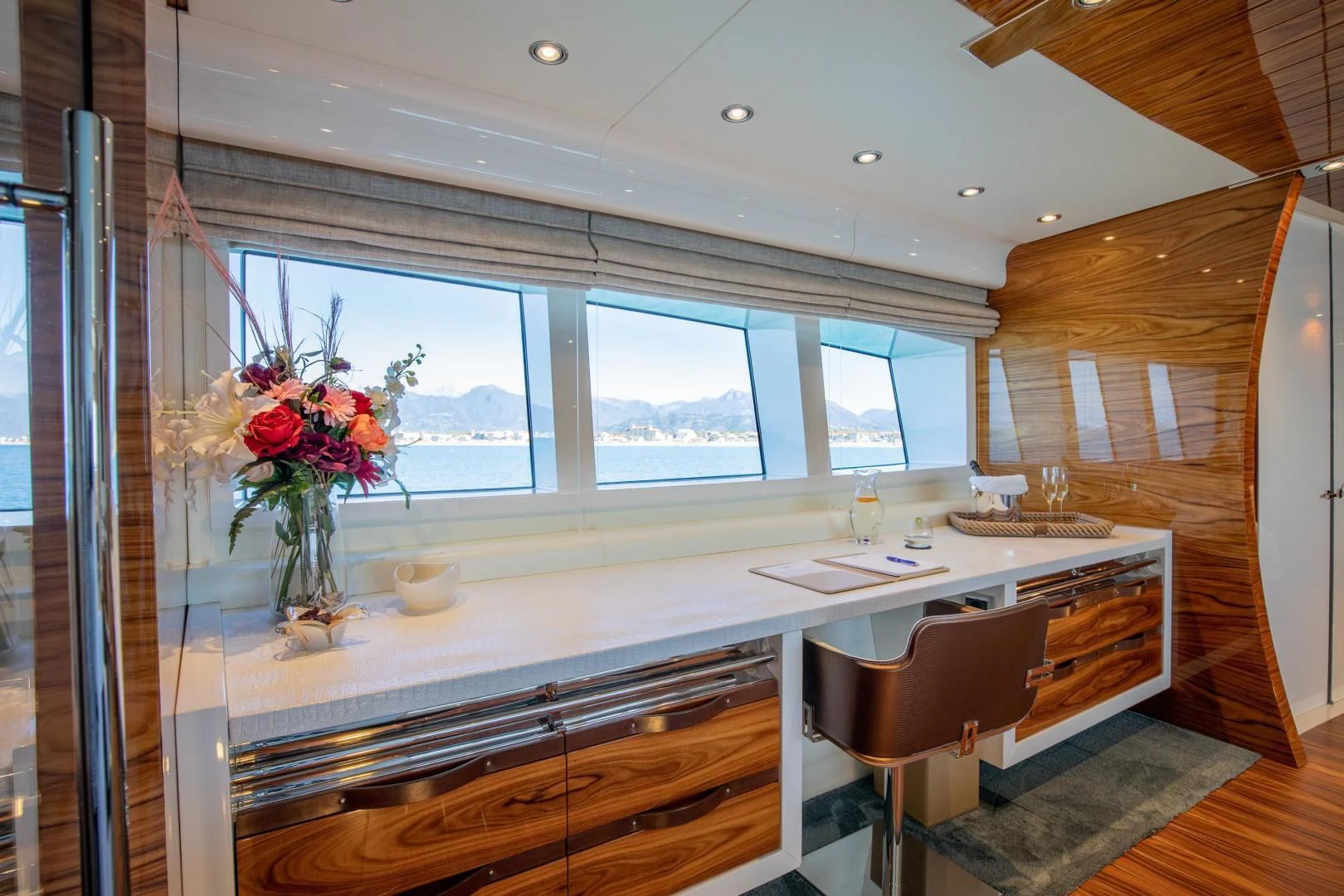 a kitchen with a large window aboard HATT MILL Yacht for Sale