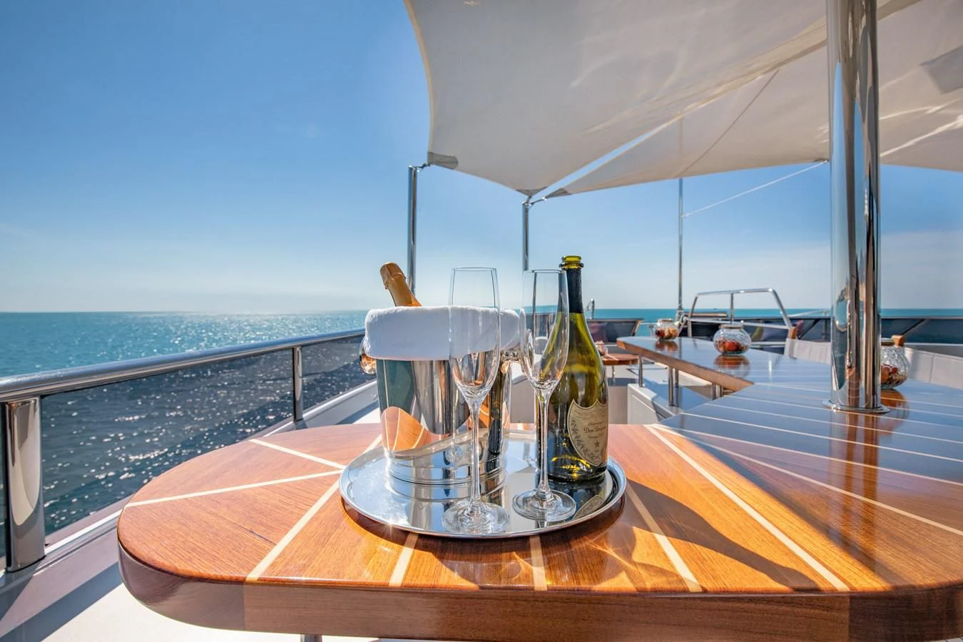 a glass of beer on a table aboard HATT MILL Yacht for Sale