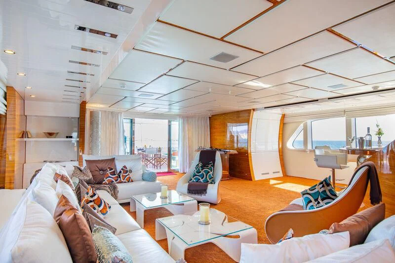 a living room with a large window aboard HATT MILL Yacht for Sale