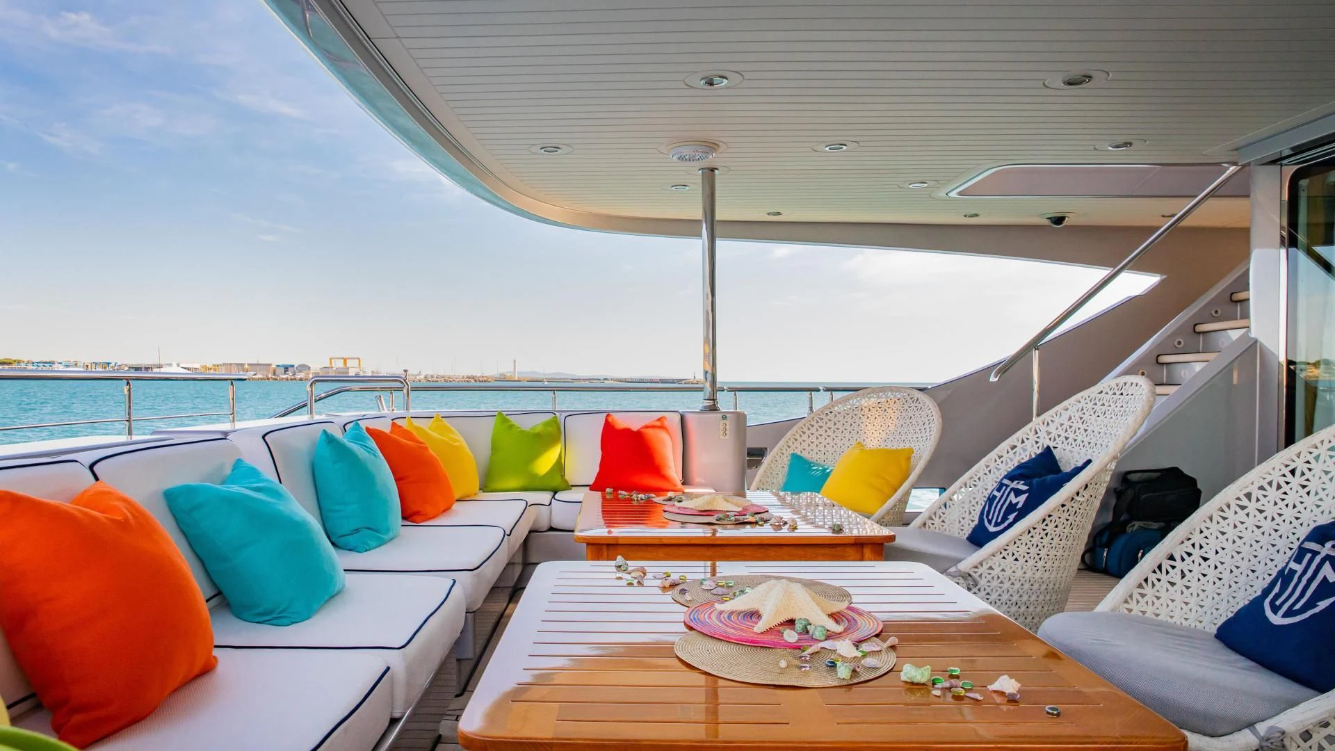 a boat with pillows and blankets on a deck aboard HATT MILL Yacht for Sale
