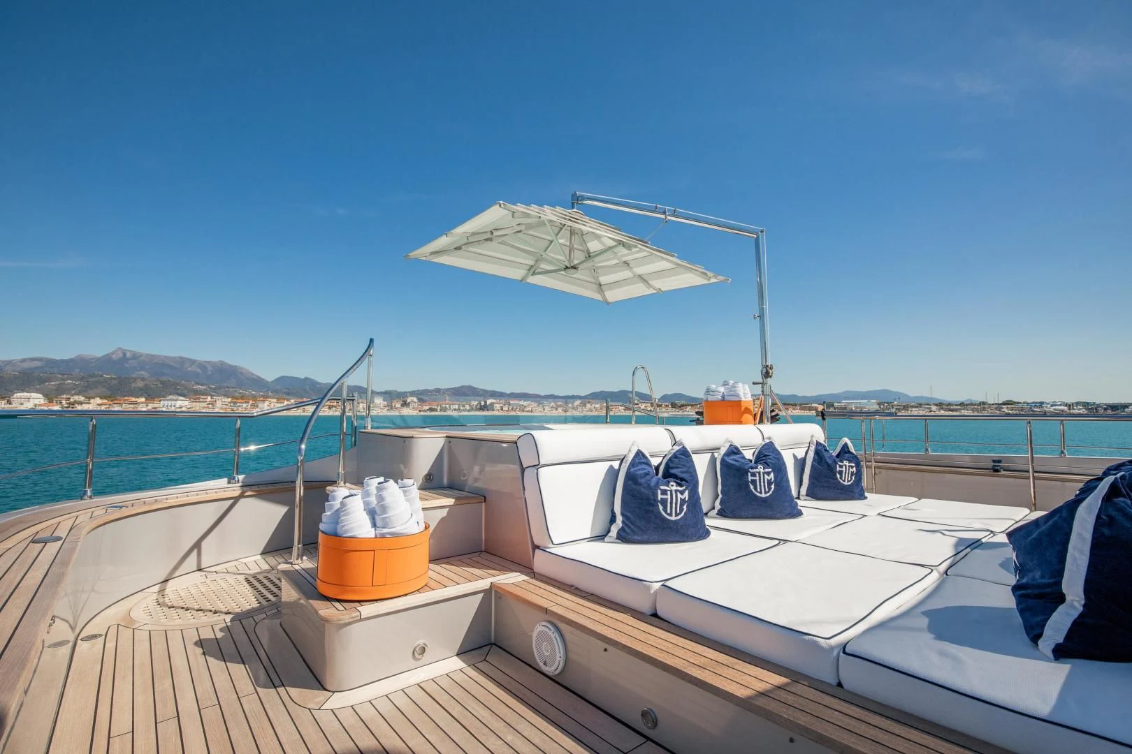 a boat with a white umbrella on it aboard HATT MILL Yacht for Sale