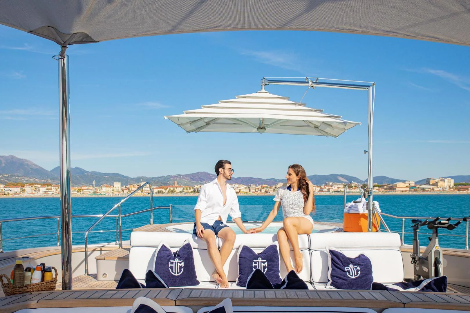 a couple of women sitting on a boat aboard HATT MILL Yacht for Sale