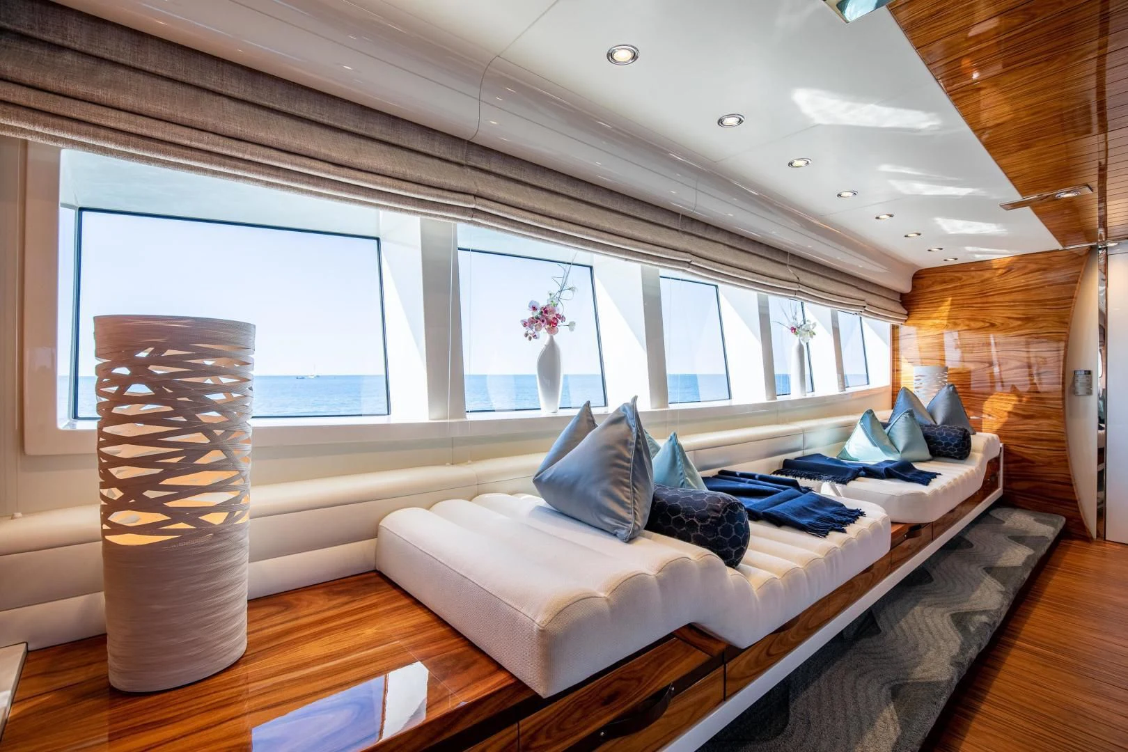 a room with a bed and a vase on the bed aboard HATT MILL Yacht for Sale