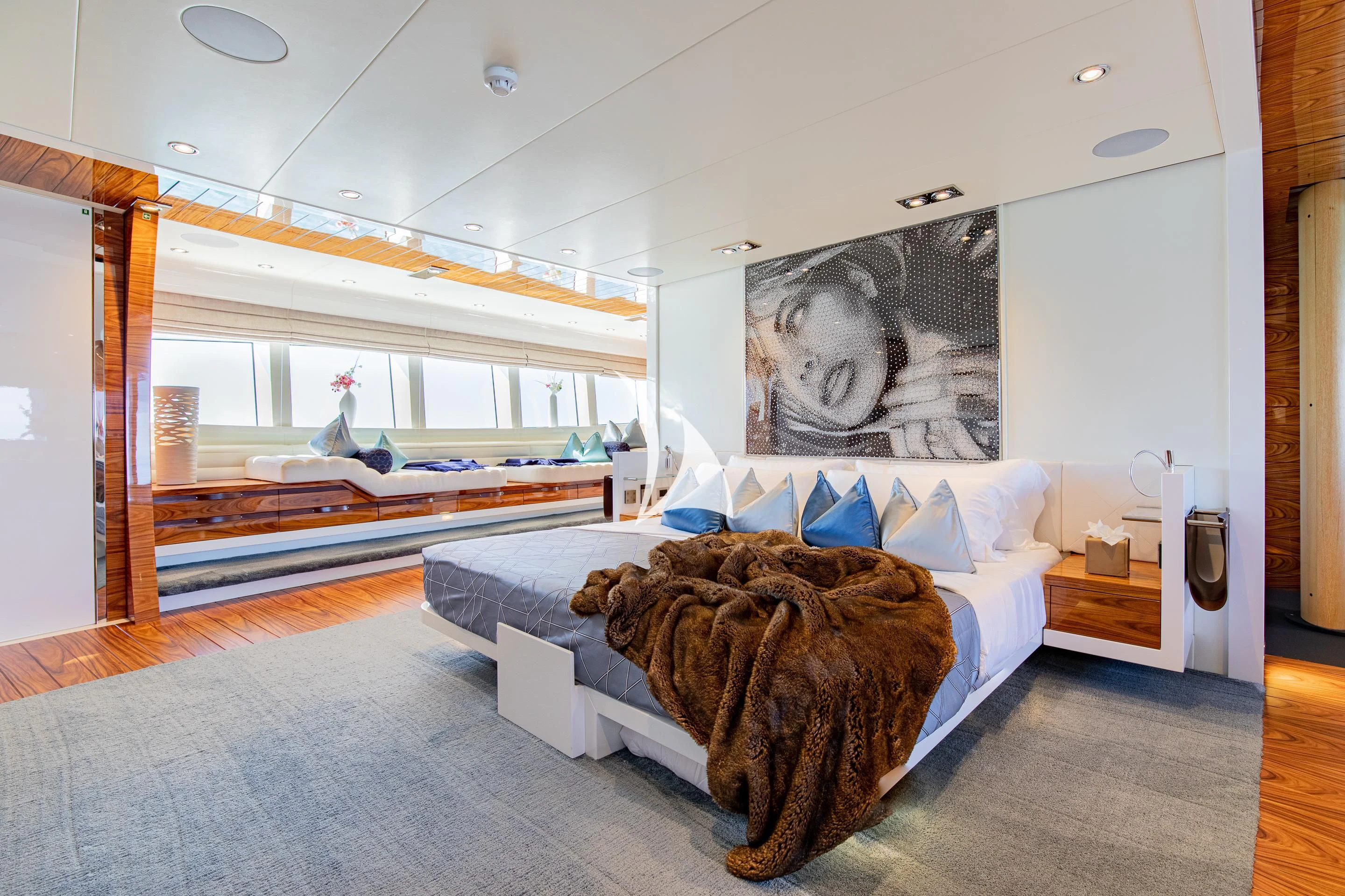 a dog lying on a bed aboard HATT MILL Yacht for Sale