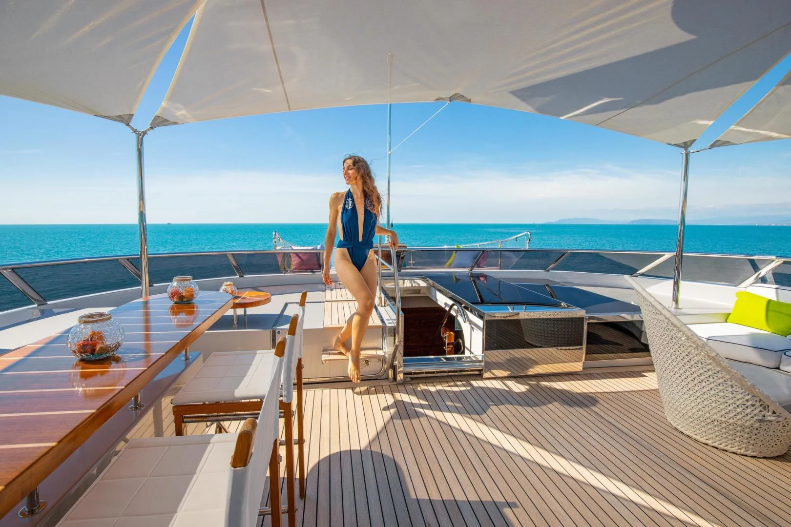 a person walking on a deck of a boat aboard HATT MILL Yacht for Sale