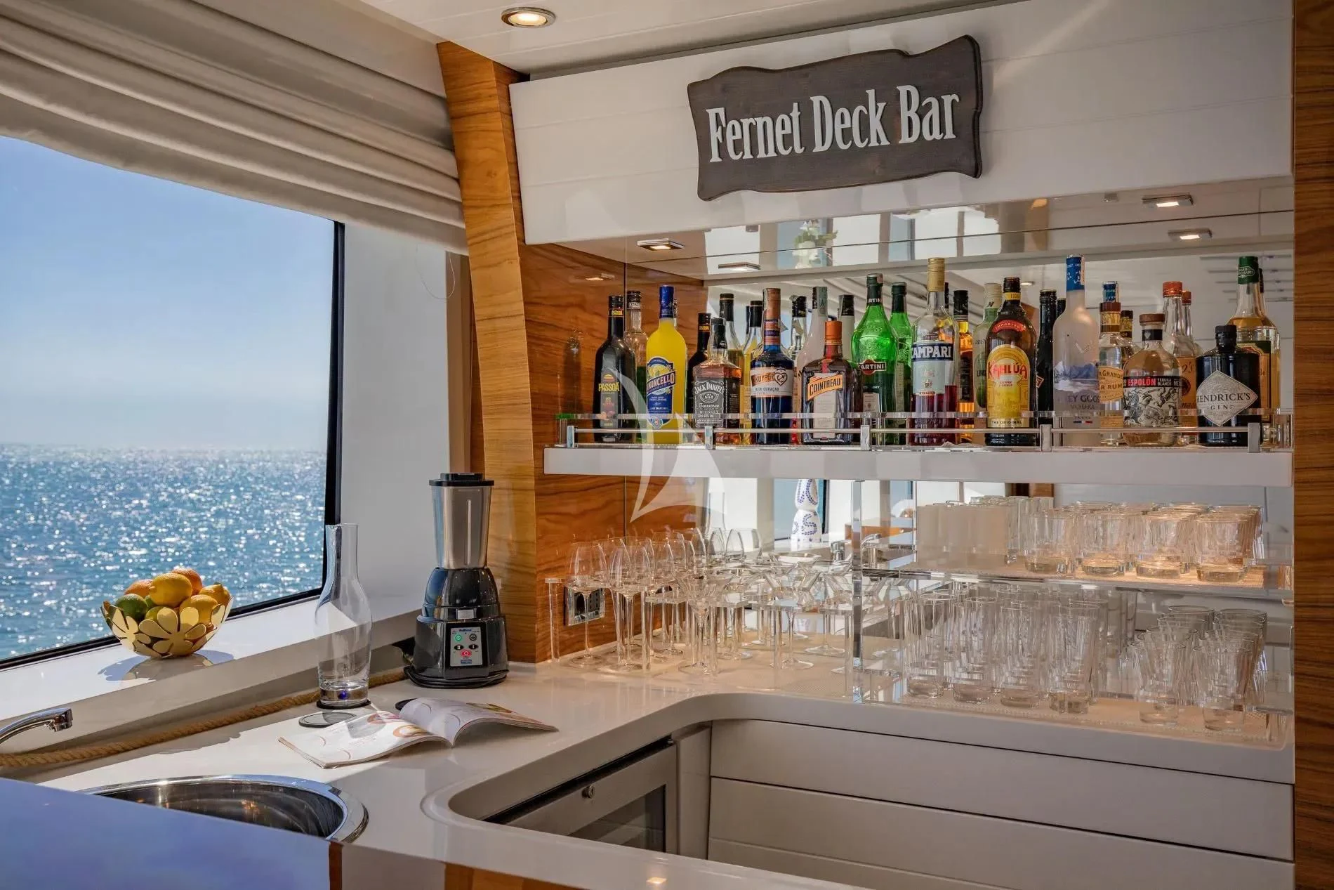 a bar with a large window aboard HATT MILL Yacht for Sale