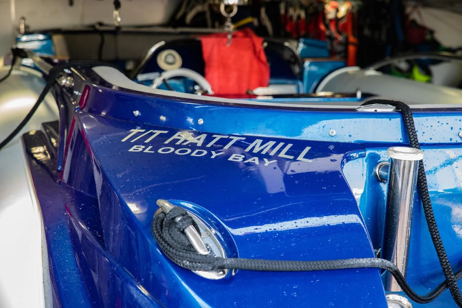 a blue car with a red bucket on the hood aboard HATT MILL Yacht for Sale