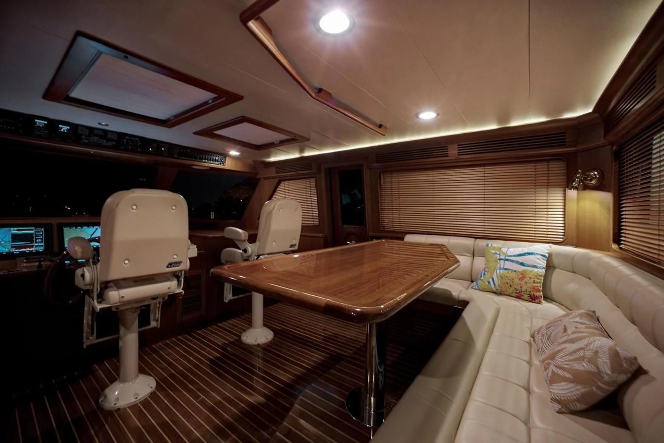 a room with a table and chairs aboard BEN'S BARGE Yacht for Sale