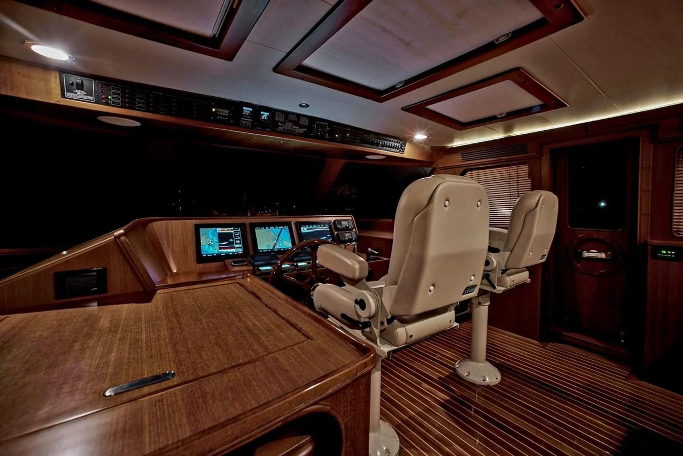 a room with a table and chairs aboard BEN'S BARGE Yacht for Sale