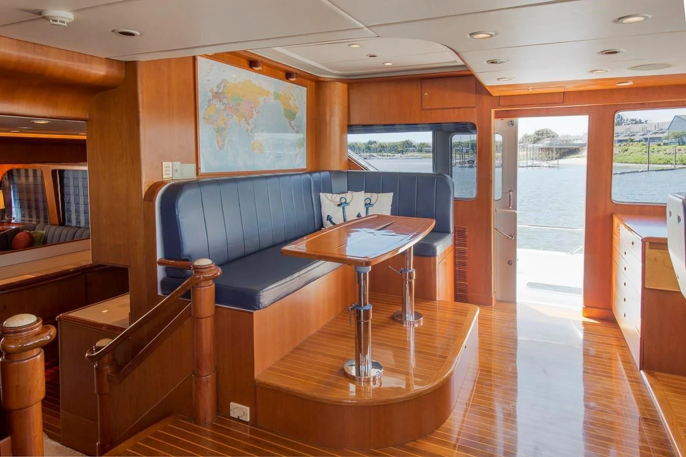 a living room with a couch and a table aboard SILVER WINGS Yacht for Sale