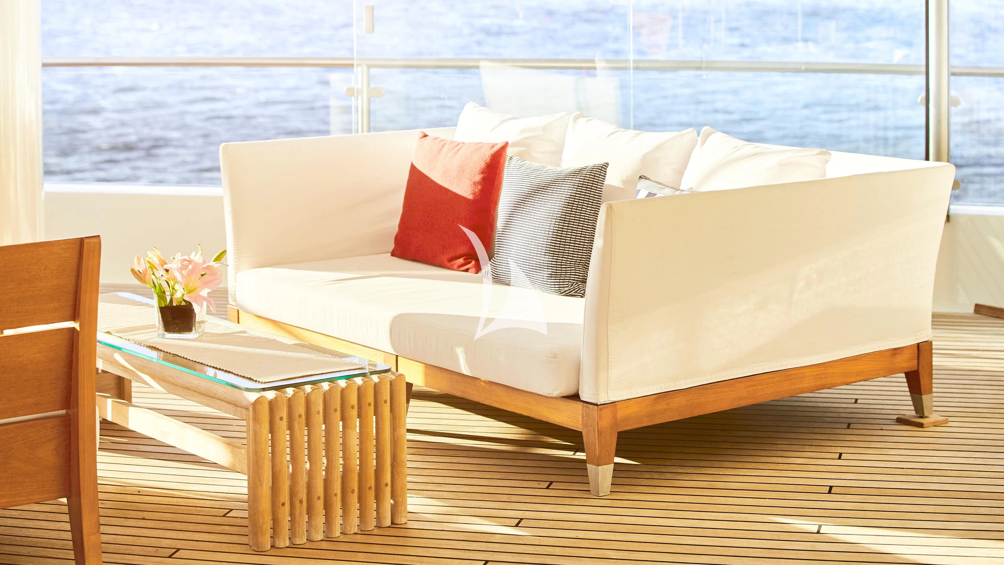 a bed with pillows aboard SENSES Yacht for Sale