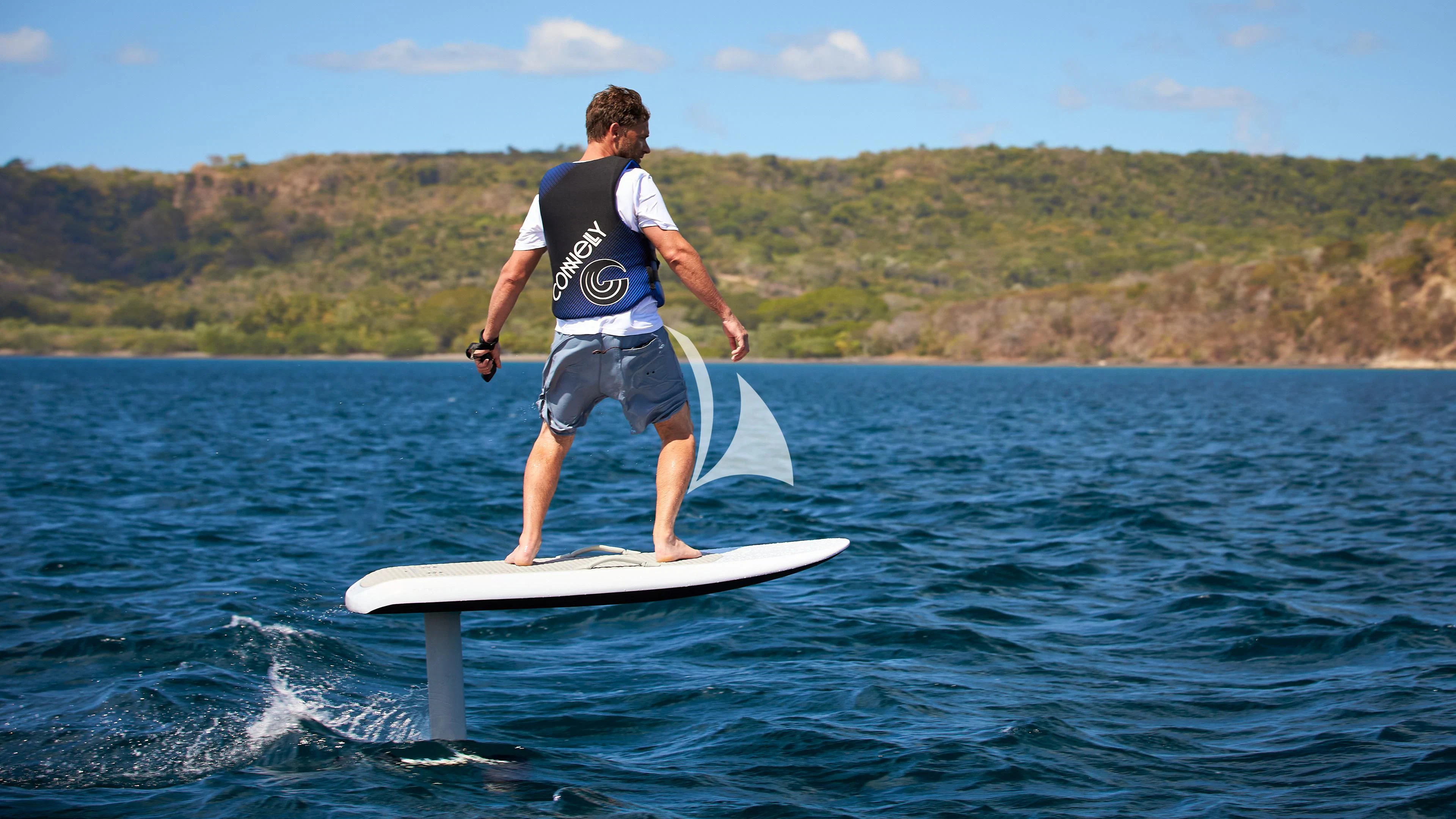 a man surfing on the water aboard SENSES Yacht for Sale