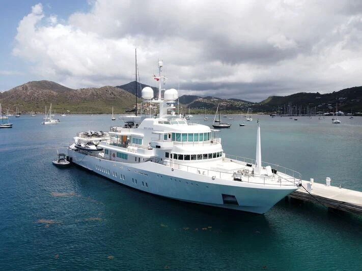 a large white boat in the water aboard SENSES Yacht for Sale