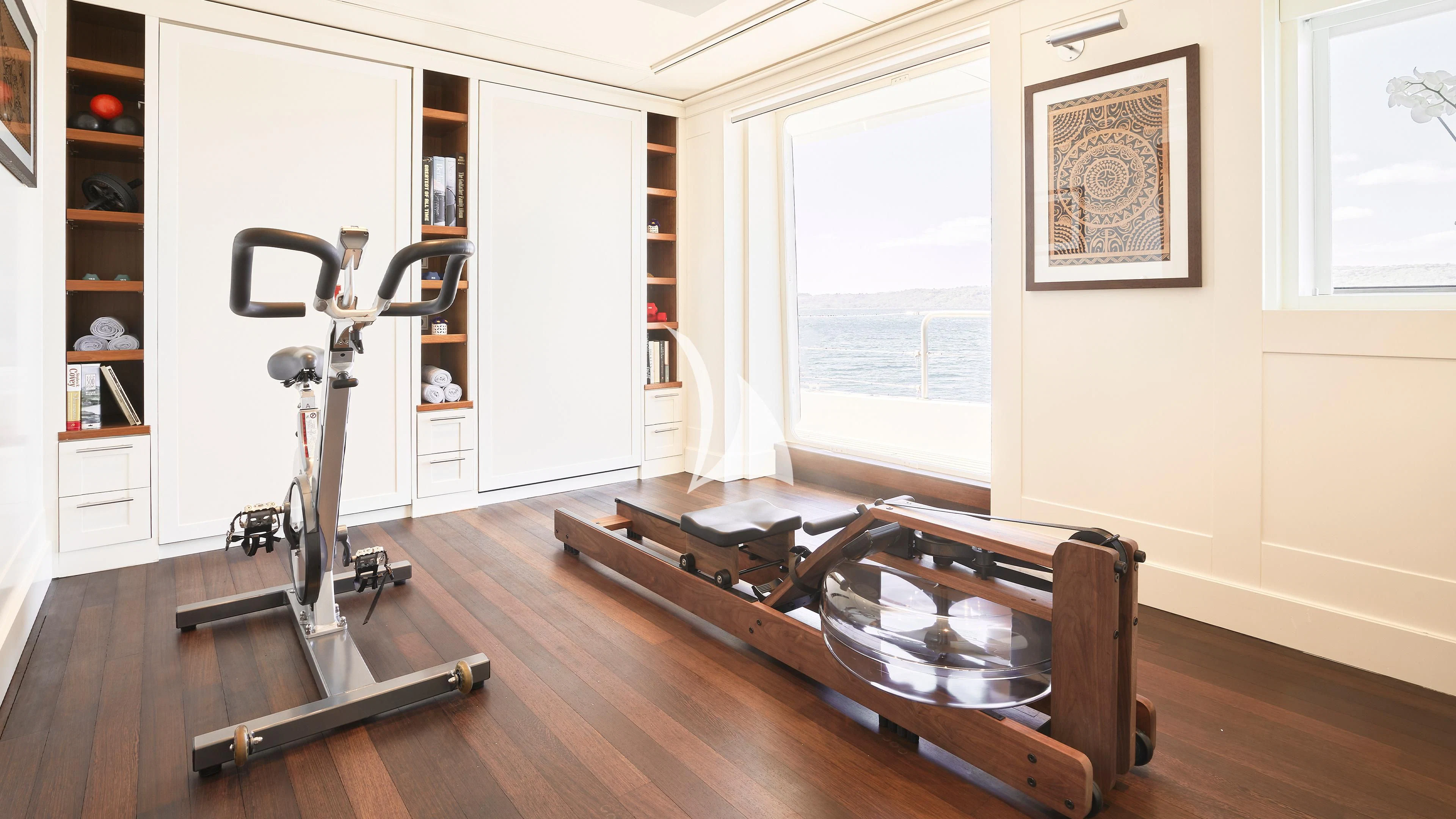 a room with a table and chairs aboard SENSES Yacht for Sale