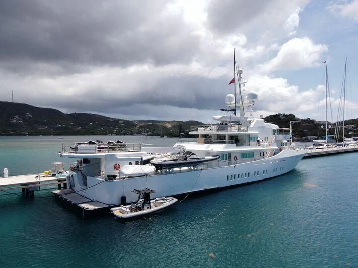 a couple of boats are parked in the water aboard SENSES Yacht for Sale