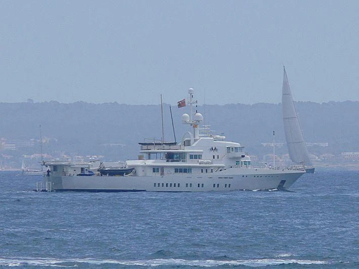 a large white boat in the water aboard SENSES Yacht for Sale