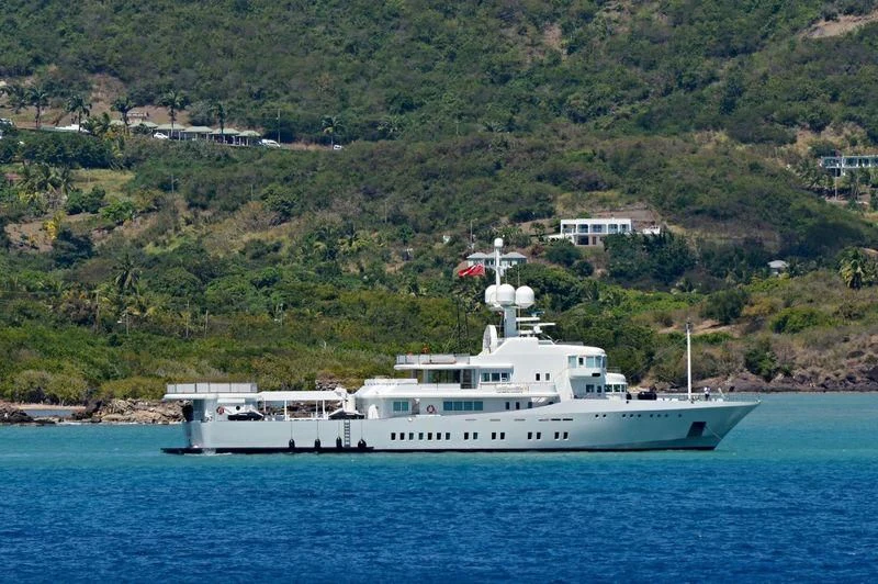 a white boat on the water aboard SENSES Yacht for Sale