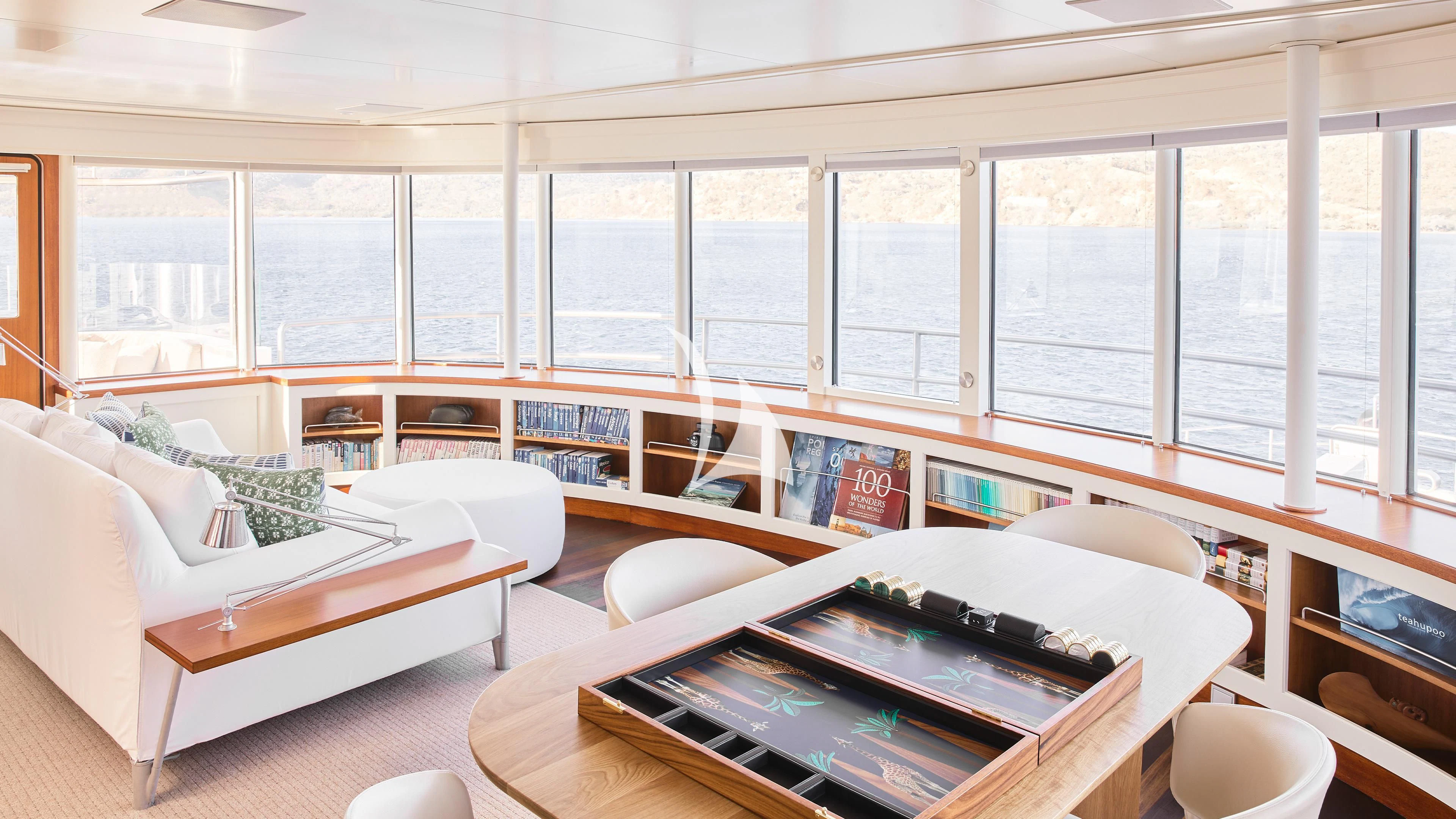 a room with a couch and a table aboard SENSES Yacht for Sale