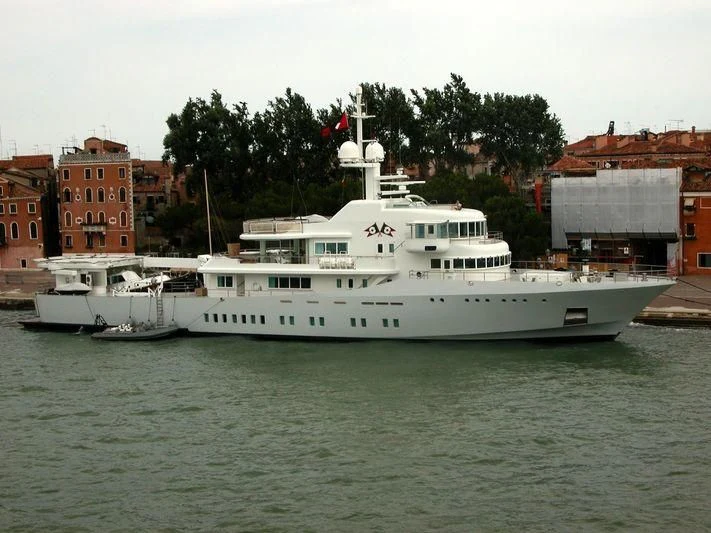 a large white boat in the water aboard SENSES Yacht for Sale