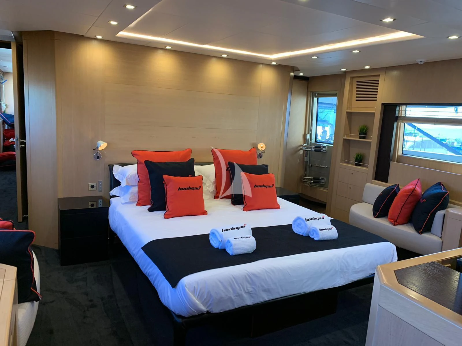 a bed in a room aboard YCM 120 Yacht for Charter