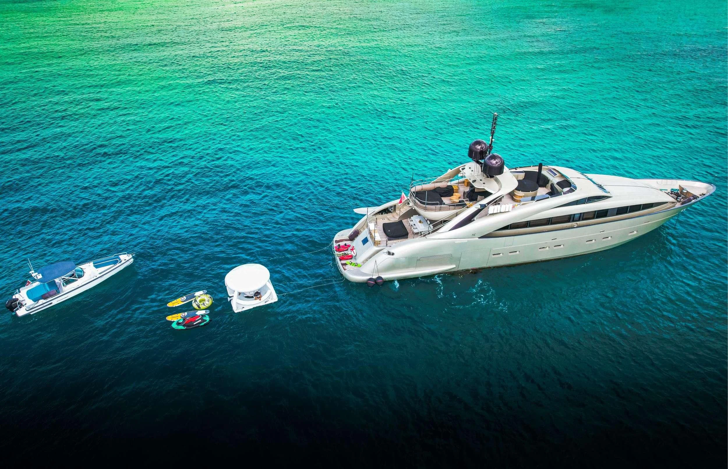 a boat with people on it aboard YCM 120 Yacht for Charter