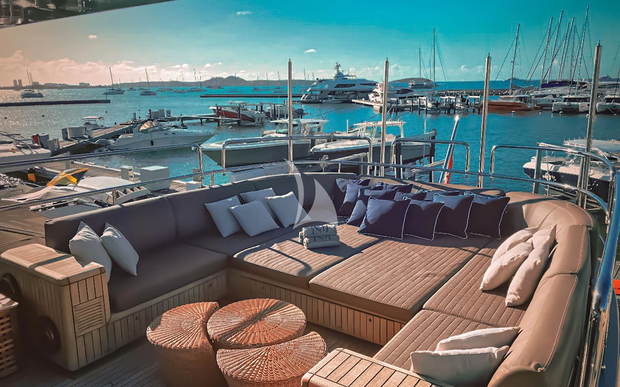 a deck with many boats aboard YCM 120 Yacht for Charter
