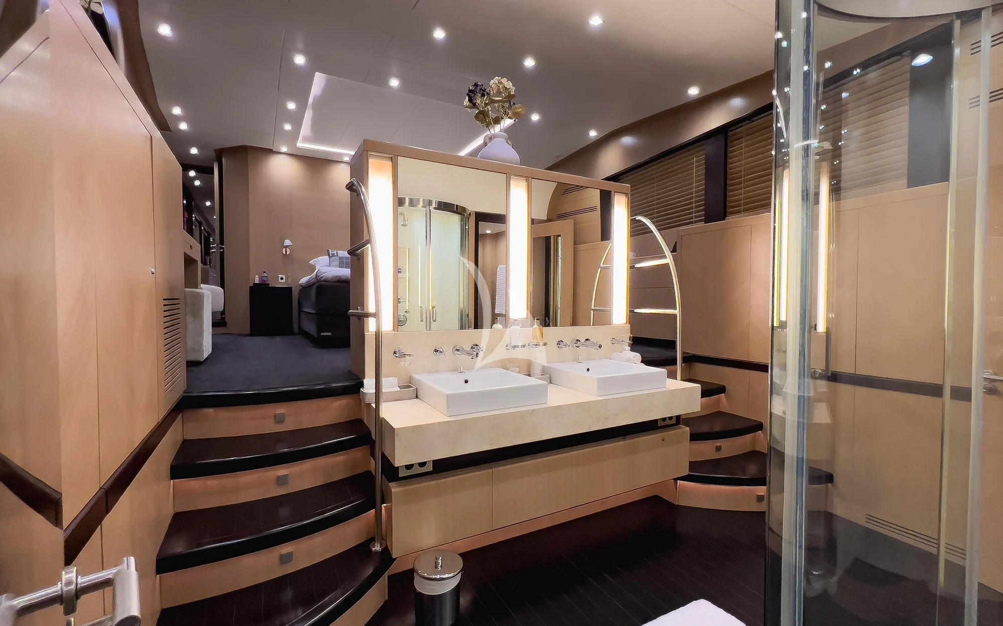 a bathroom with a sink and a mirror aboard YCM 120 Yacht for Charter
